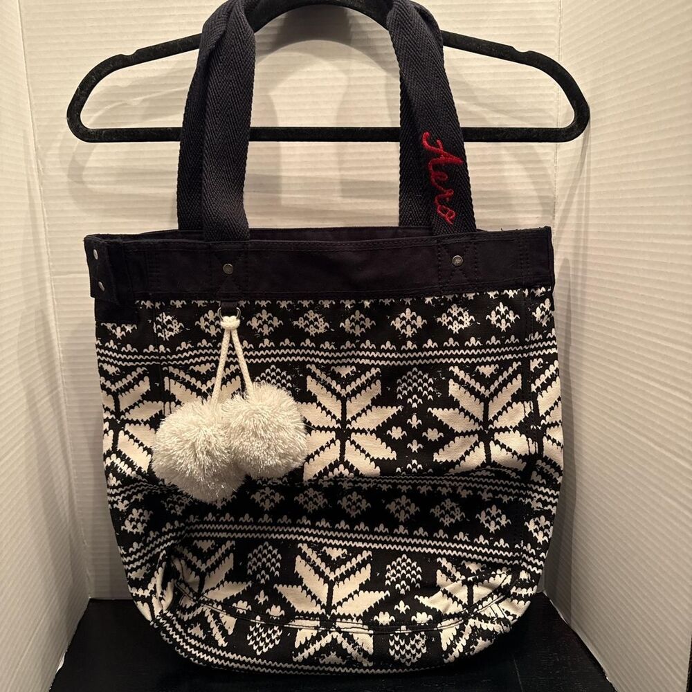 Aeropostale black and white fair isle tote bag with white pom-pom attachments